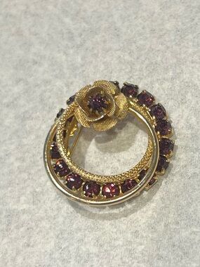 Gold Floral Circle Brooch with Purple Stones